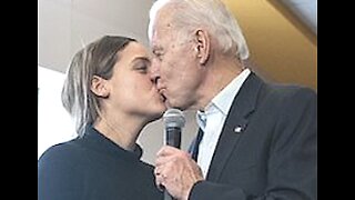 2020: Joe Biden kissing granddaughter on lips during Iowa rally