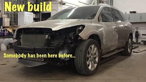 Rebuilding a 2015 Buick Enclave totaled by the air bags that someone else never finished