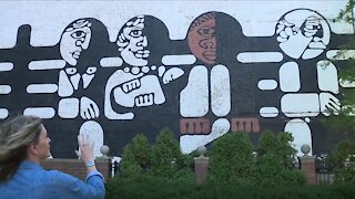 Iconic 1969 Cleveland mural of 4 diverse faces gets facelift this fall