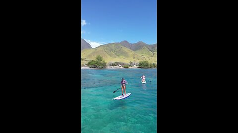 Paddle board sisters