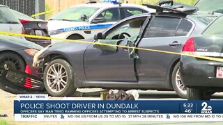 'It’s a little disheartening': Police shoot driver after attempting to ram officers arresting murder suspects