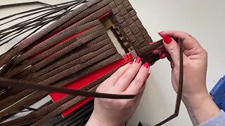 DIY Wicker basket made of wallpaper leftovers