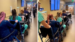 Hospital staff unite to create a moving train of joy