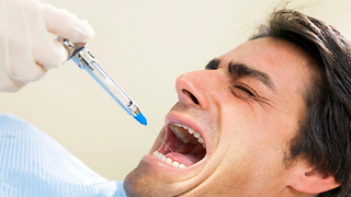 Dad's turn to get the needle at the dentist.