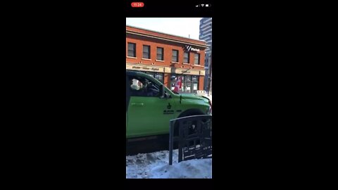 Police in Ottawa back into protestor’s truck then arrest him for it.