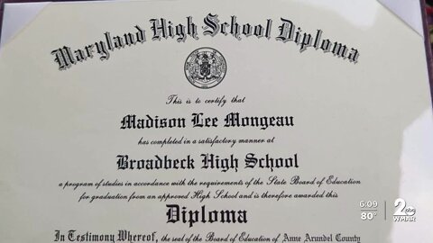 Graduating seniors at Broadneck High School receive diploma with major typo