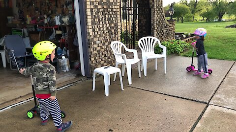 Sibling Scooter Race Ends In Hysterical Screaming Argument