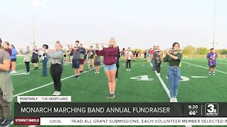 Monarch Marching Band creating smiles while raising money for the team