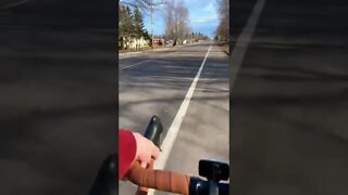 First person biking through town