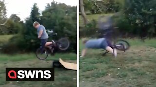 Watch the moment a boy is sent flying over his handlebars after a ramp snaps