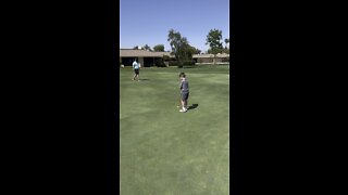 Mateo Putts on the 14th Green