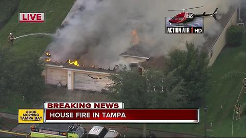 Crews with Hillsborough County Fire Rescue battle large house fire in Tampa