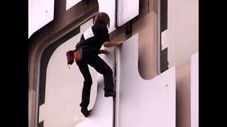 'Spiderman' Climbs French Tower