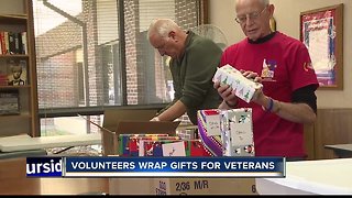 Volunteers wrap gifts for veterans ahead of holidays