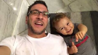 Father tries to teach adorable baby son how to say vowels