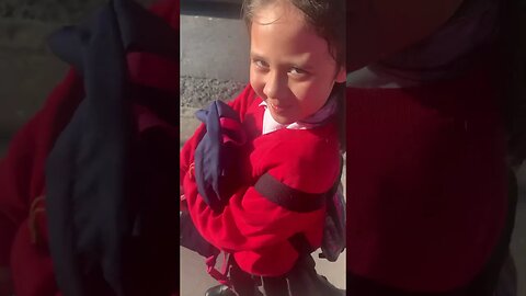 Baby girl first day school smile -hilarious