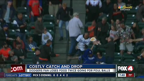 Fan drops food TWICE to catch foul balls at baseball game