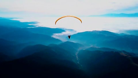 Drone flight captures paragliding above majestic Wild Carpathia