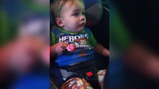 A Tot Boy Gets Scared And Cries As He Goes Through A Car Wash