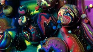 A psychedelic mixture of oil, soap, and paint