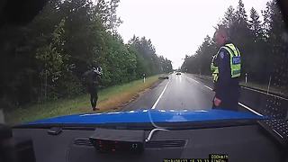 Speeding motorcycle crashes when he spots the police