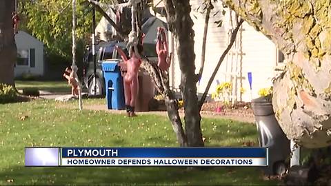 Homeowner defends creepy Halloween decorations