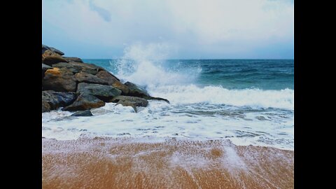 Beautiful sounds of ocean waves lapping the beach