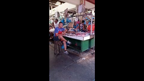 Filipinos Working and Shopping in the City Market
