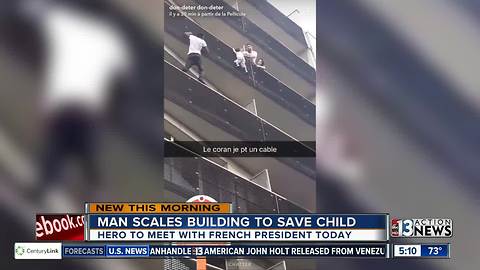 Man saves child dangling from balcony