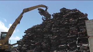 Recycling company purchases destroyed cars from massive fire