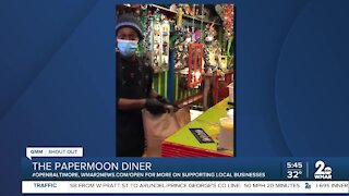 The Papermoon Diner says "We're Open Baltimore!"