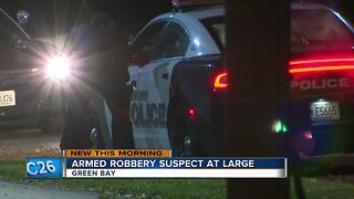 Green Bay robbery suspect at large