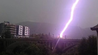 Man Whips His Camera Out Just As Bridge Gets Hit By Lightning