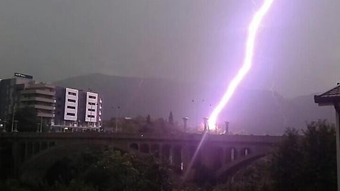 Man Whips His Camera Out Just As Bridge Gets Hit By Lightning