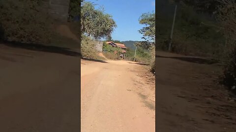 Motor biking in a Laos Village near Vietnam border