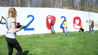 Teachers paint wall for class of 2020