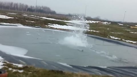Guys Make A Firework Explosion Under A Layer Of Ice