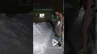 Guy goes for a snow dip