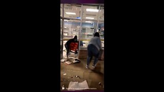 WATCH: Looters Sprint Out of Store with Arm Loads of Stolen Goods in Brooklyn Center