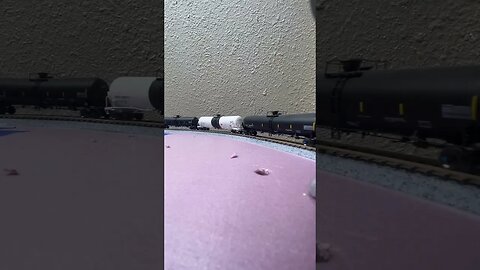 N Scale GP40s throttling up to pull a hill