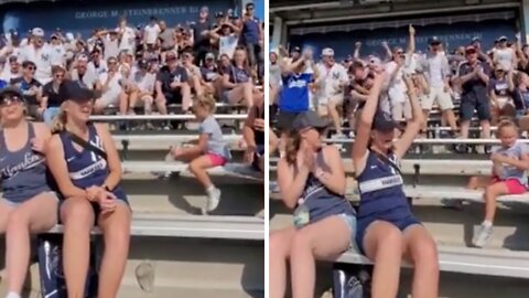 Fans at Yankees game cheer for little girl's bottle flip