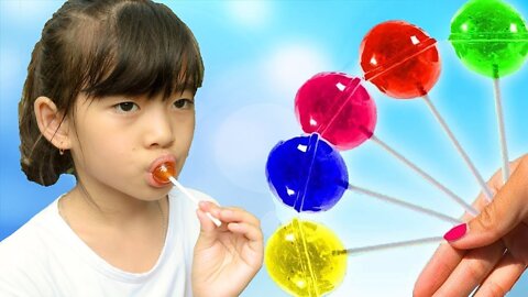 kid and Sister pretend play with Fruit Lollipops