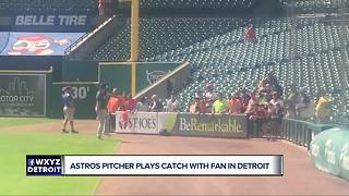 Astros pitcher Lance McCullers plays catch with fan in Detroit