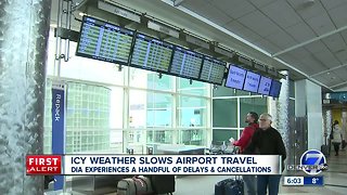 Icy weather slows airport travel
