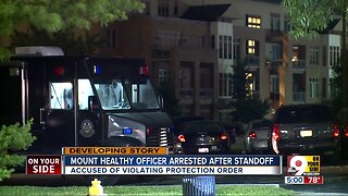 Mount Healthy officer arrested after standoff