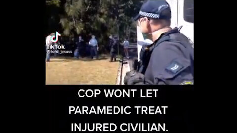 Australia CovidTyranny - 10 - Cop not letting paramedic treat injuried civilian