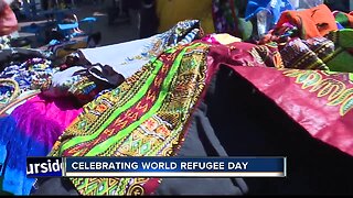 Community members gather for world refugee day at Grove Plaza