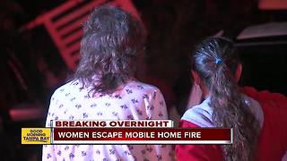 Women escape mobile home fire