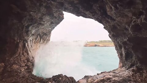 Stormy ocean from cave ambiance