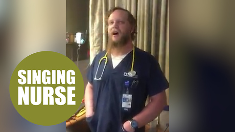 This is the touching moment a nurse soothed an anxious patient - by SINGING to her